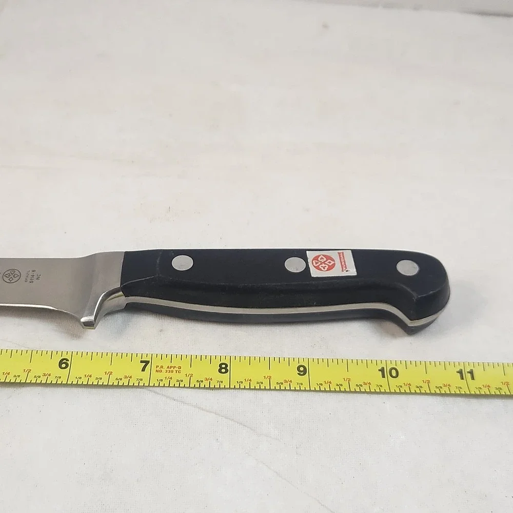 Mundial 5114-6 Boning Knife Stainless Steel Brazil Black Handle Full Tang Rivet